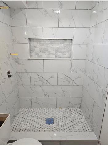 Tiled shower niche and bench detail