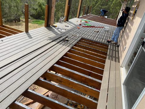 Composite decking going down over new framing