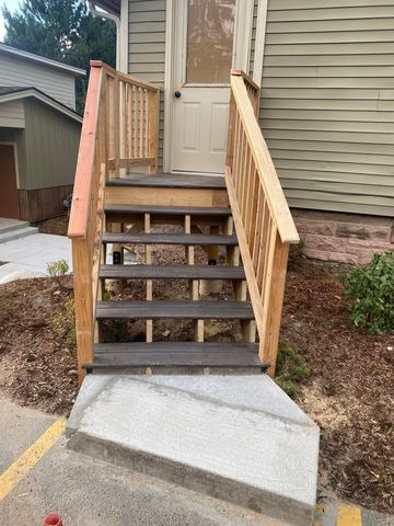 New exterior stairs, landing and railing