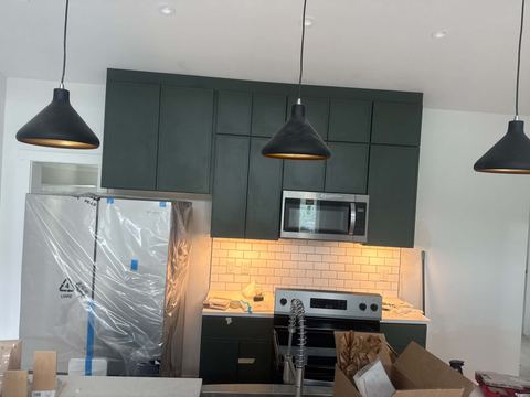 Shaker cabinets and subway tile backsplash