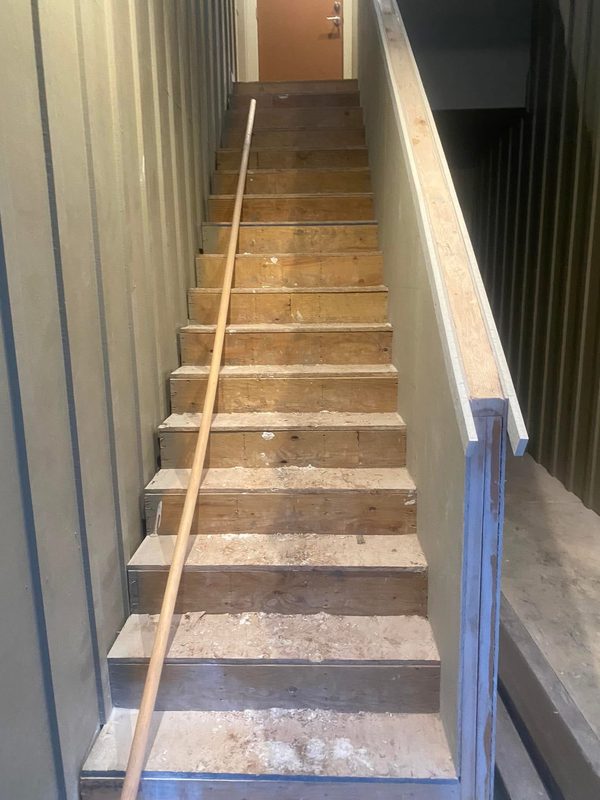 Worn stairway before the rebuild